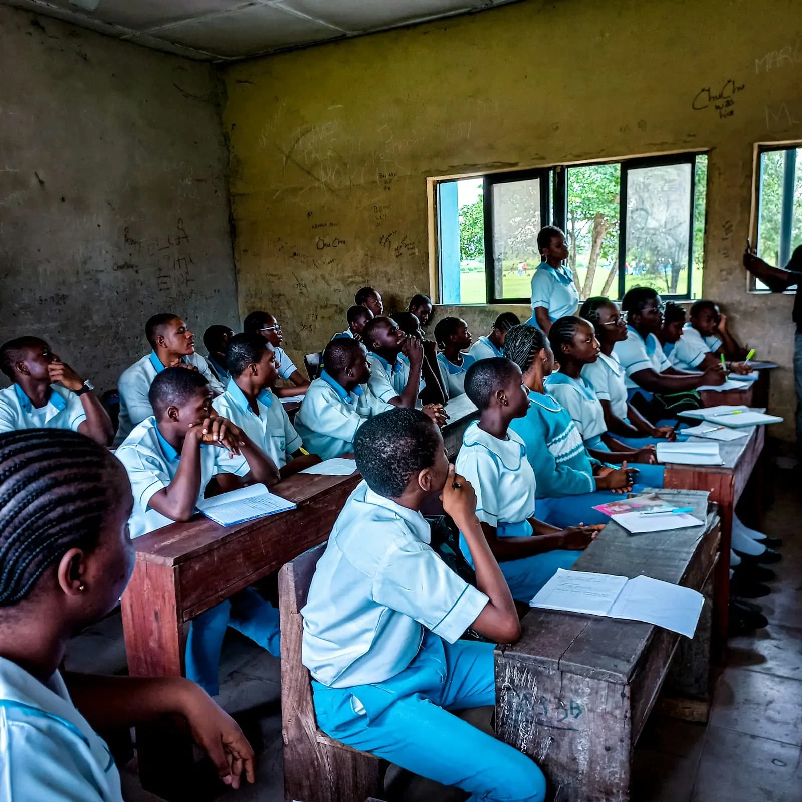 Primary pupils in uniform during a lesson