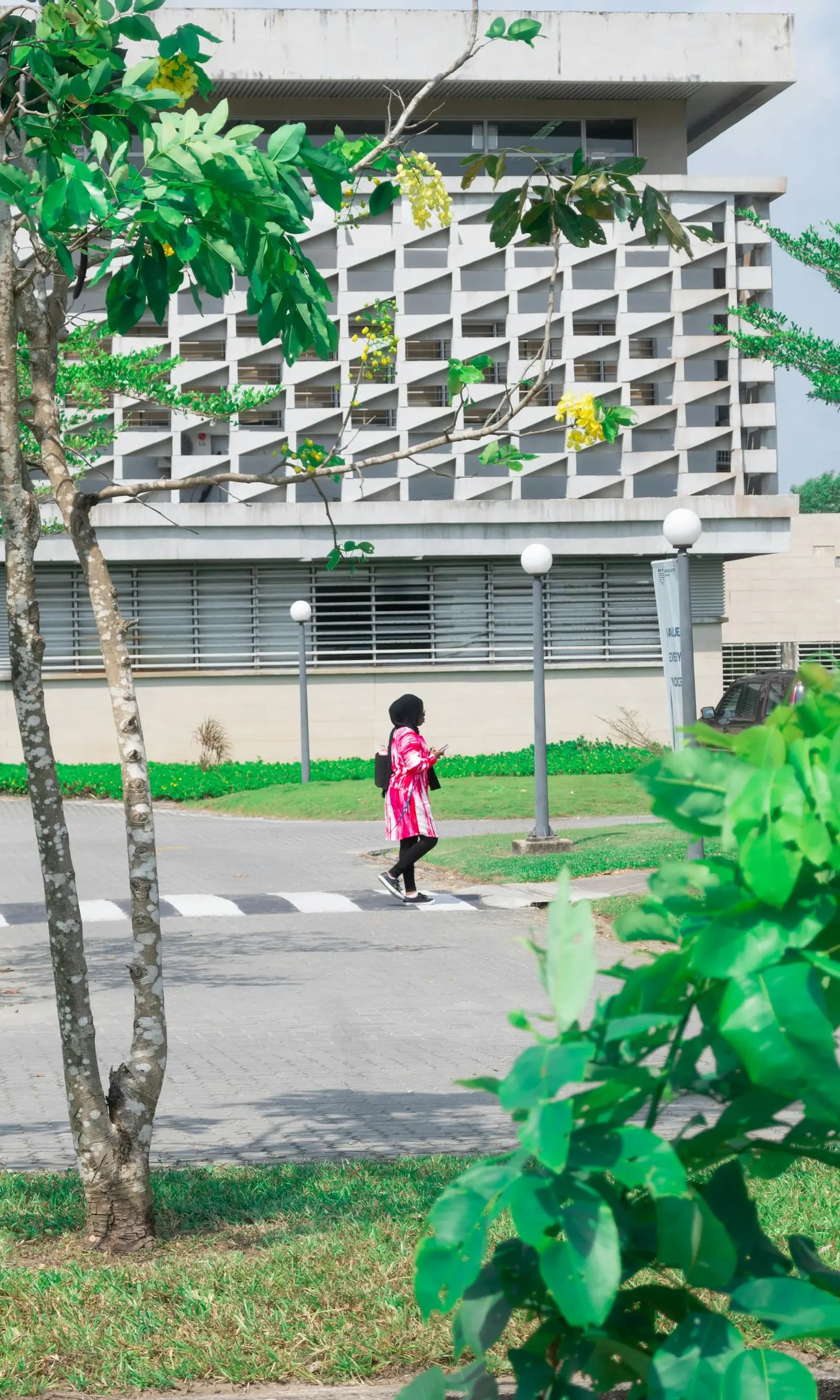 Modern school building and green grounds